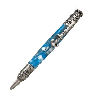 The Antique Pewter Nautical Theme Hand Turned Pen With Antique Brass Trim - Blue Wave by Paul's Hand Turned Creations.  The resin color is blue with white. 