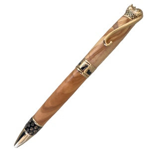 A hand turned cat pen depicting a sleeping cat for the clip, cat images on the center band, and paw prints near the nib with a light colored wood and made by Paul’s hand turned creations. 