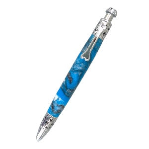 Picture of a hand turned dog click pen that has a dog bone for the clip, and dog saying in the bottom I love my dog.  The resin is blue with black swirls and is on a chrome trim.  Made by Paul’s hand turned creations. 