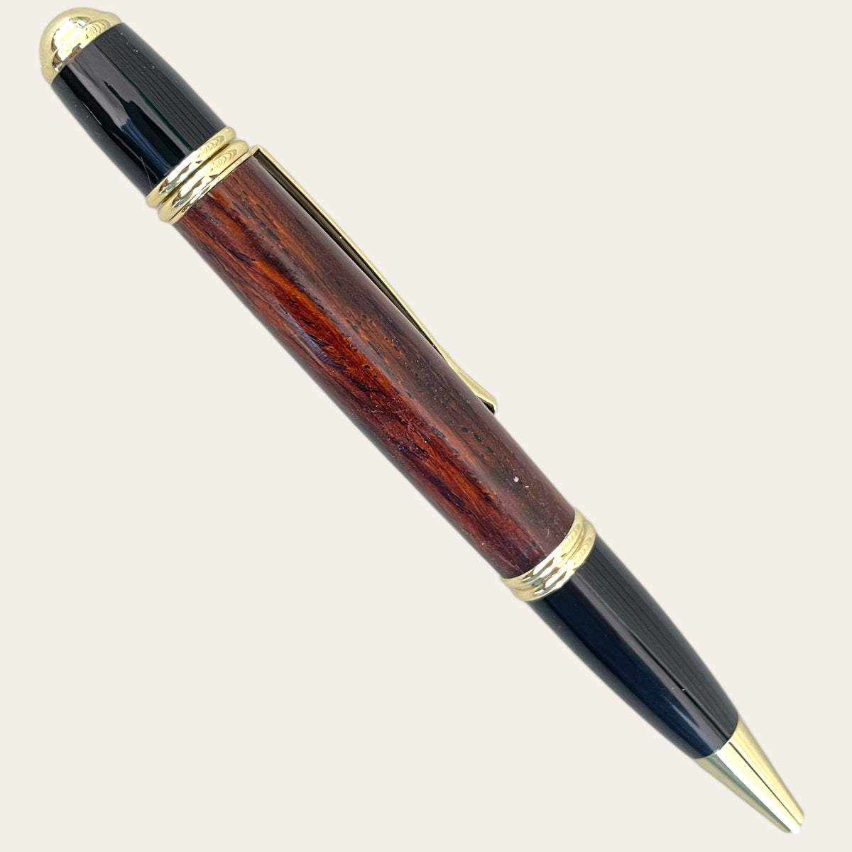 Paul's Hand Turned Cocobolo Wood Gatsby Pen with Gold Trim and Glossy Black Cap.