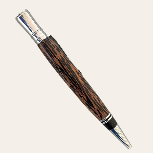 Paul's Coconut Wood Executive Pen with chrome trim, showcasing unique craftsmanship.