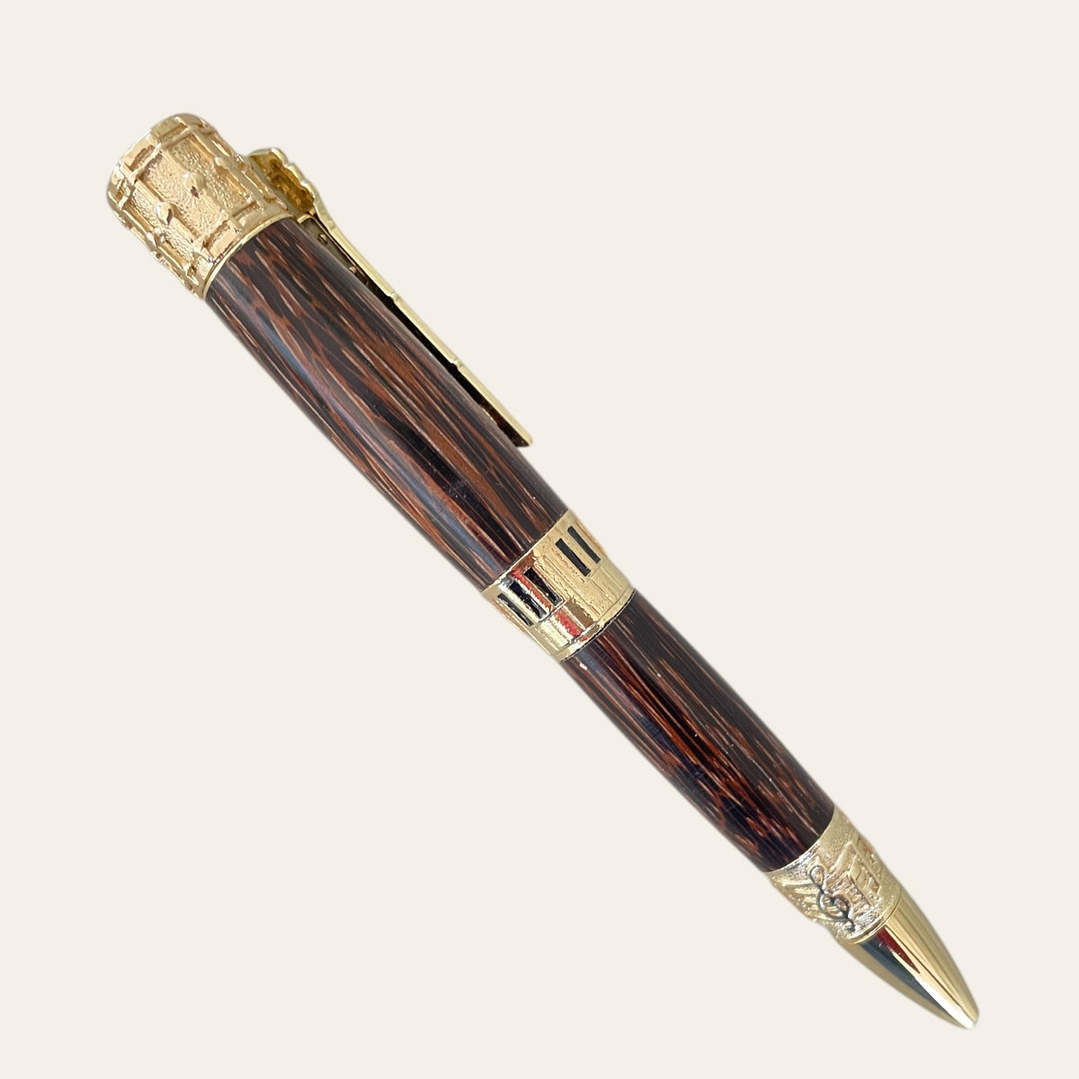 Luxury hand-turned music pen, gold trim, coconut wood pattern by Paul's Hand Turned Creations.