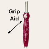 Cranberry seam ripper that shows that a notch is turned into the handle for a grip aid. Paul’s Hand Turned Crearions