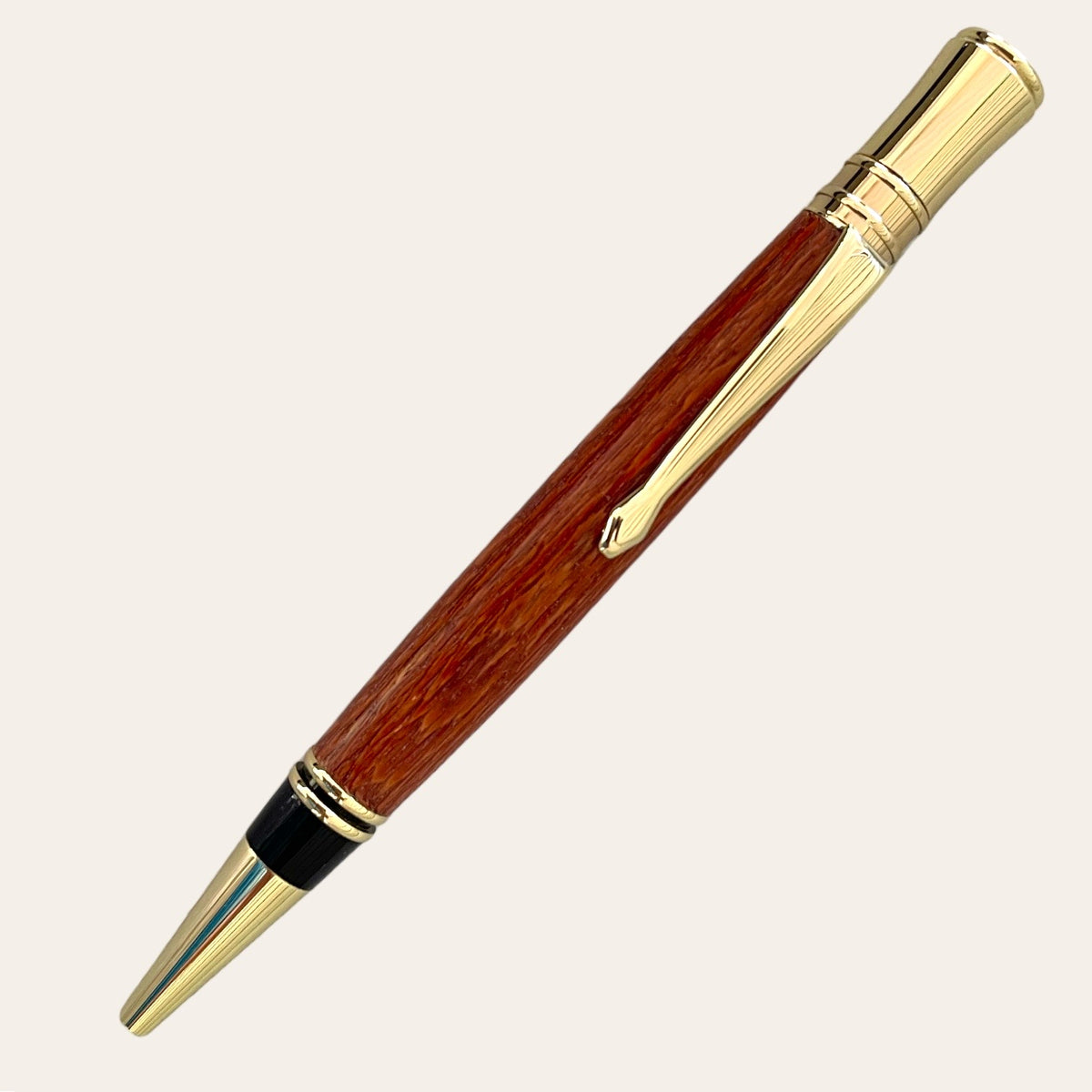 Stunning gold trim for the executive pen for the letter opener set. Hand turned with leopard wood. Paul's hand turned creations