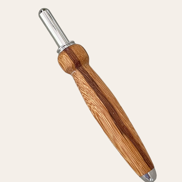 The Zebrawood Hand Turned Single Blade Seam Ripper by Paul's Hand Turned Creations features a handle with a smooth, rounded shape and a visible wood grain pattern for a natural, rustic look. Its shiny, polished stainless steel blade is excellently crafted for precise cutting.