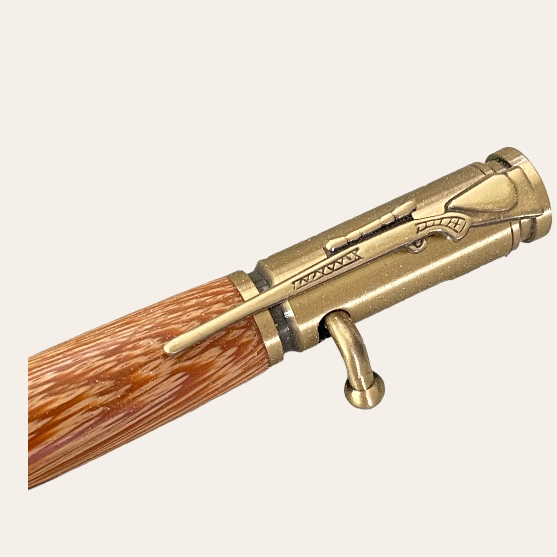 Bolt Action ballpoint bullet pen, .30 caliber in brass wire braid with an antique brass hardware outlet finish, my Item 102330