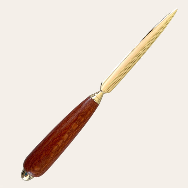 beautiful letter opener made with exotic leopard wood. Paul's hand turned creations