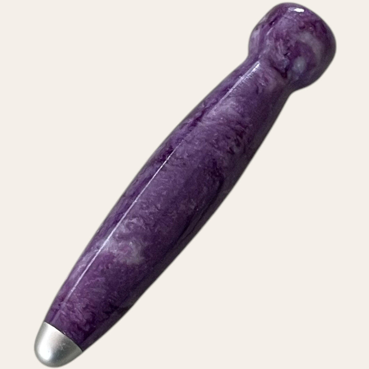 The resin handle is shown with lilac hue.  This fits the nine interchangeable crochet hooks. 