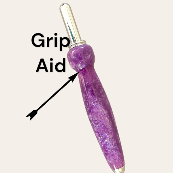 Lilac seam ripper by Paul's Hand Turned Creations with "Grip Aid" on hand-turned resin handle.