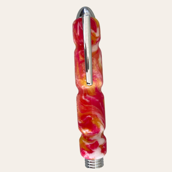 Handmade, glossy lotus pen with red-yellow swirl & silver accents by Paul's Creations.