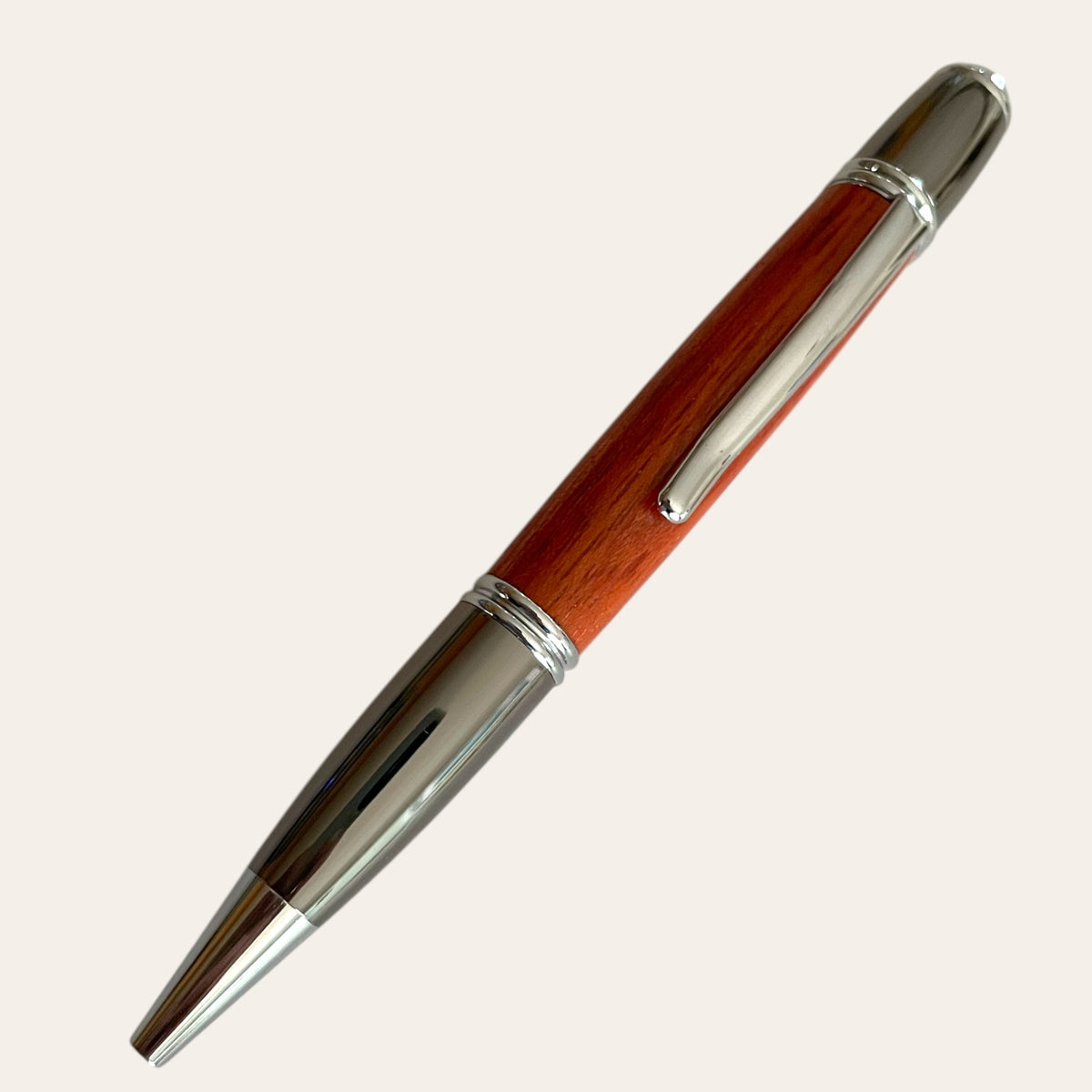 Gatsby Padauk Wood Pen with Gun Metal Trim by Paul's Hand Turned Creations.