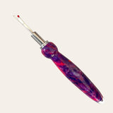 Razzle Dazzle seam ripper by Paul's Hand Turned Creations on a plain background.