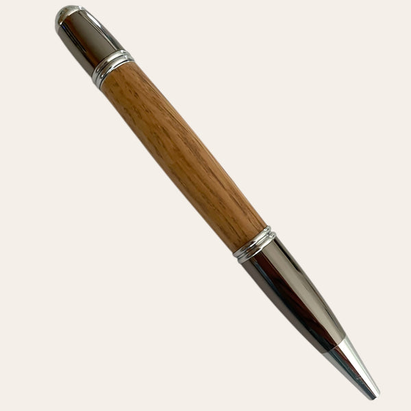 Gatsby refillable pen, gun metal trim, red oak wood by Paul's Hand Turned Creations.