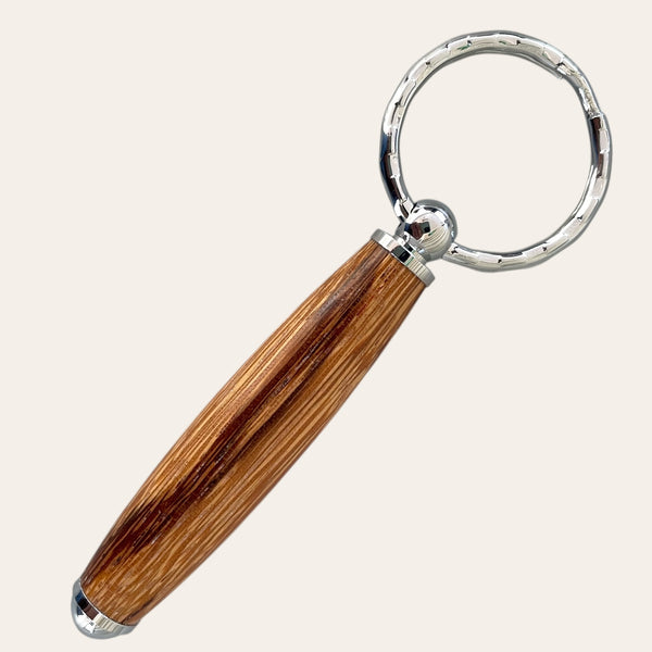 Zebrawood keychain bottle opener by Paul's Hand Turned Creations.