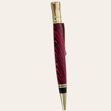 Back of the red and black spectraply wood refillable pen with gold trim. Paul's Hand Turned Creations