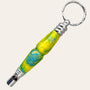 Introducing the Sunbeam Secret Compartment Key Chain with Safety Whistle by Paul's Hand Turned Creations, featuring a vibrant blue-yellow handle and a sleek silver ring.