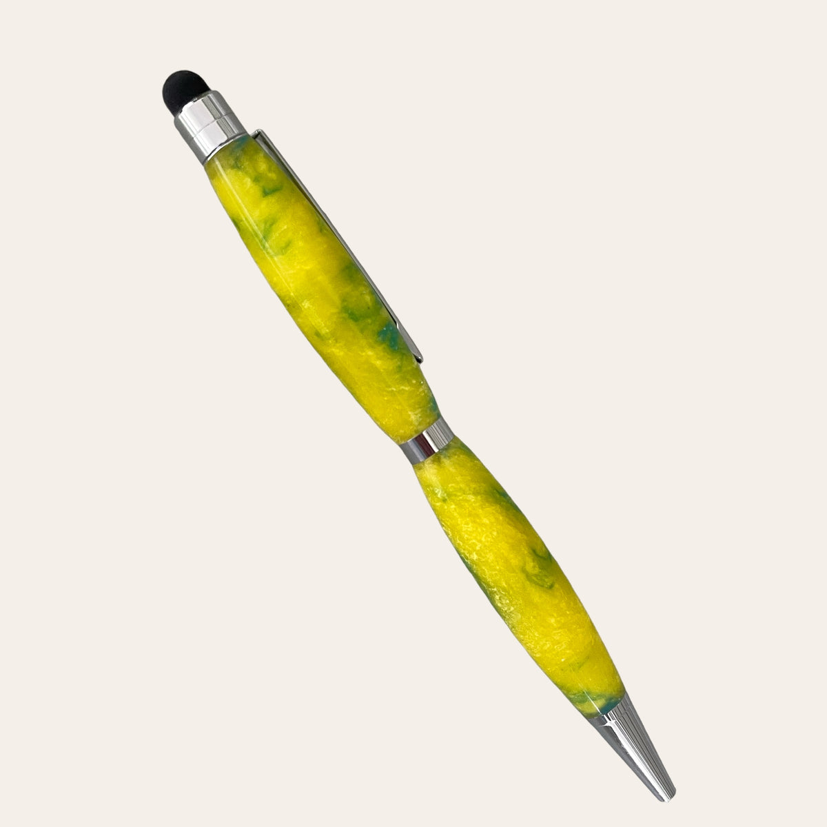 The Resin Refillable Stylus Pen Chrome Trim - Sunbeam from Paul's Hand Turned Creations features a vibrant yellow and green marbled body with chrome accents. This handmade lathe-turned pen includes a black stylus tip for touchscreen devices on one end. It is displayed diagonally against a plain, light background.