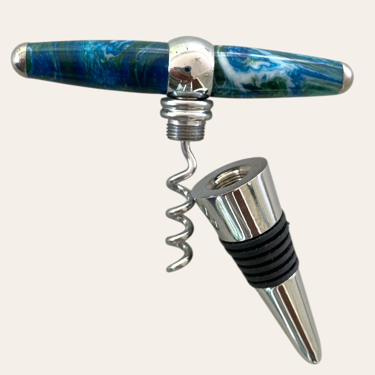 The "Under The Sea" Resin Hand Turned T-Handle Winetopper Corkscrew by Paul's Hand Turned Creations is a stylish combination of elegance and utility, making it an ideal wine-topper.