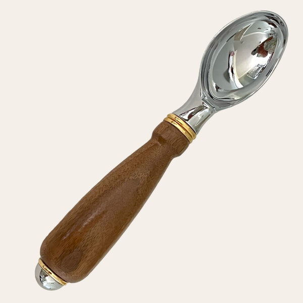 Front of the walnut ice cream scoop that is hand turned by Paul on his lathe. Paul's Hand Turned Creations