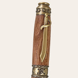 Clip showing the sword on the Laurel Oak pirate pen with gold trim. Paul's Hand Turned Creations