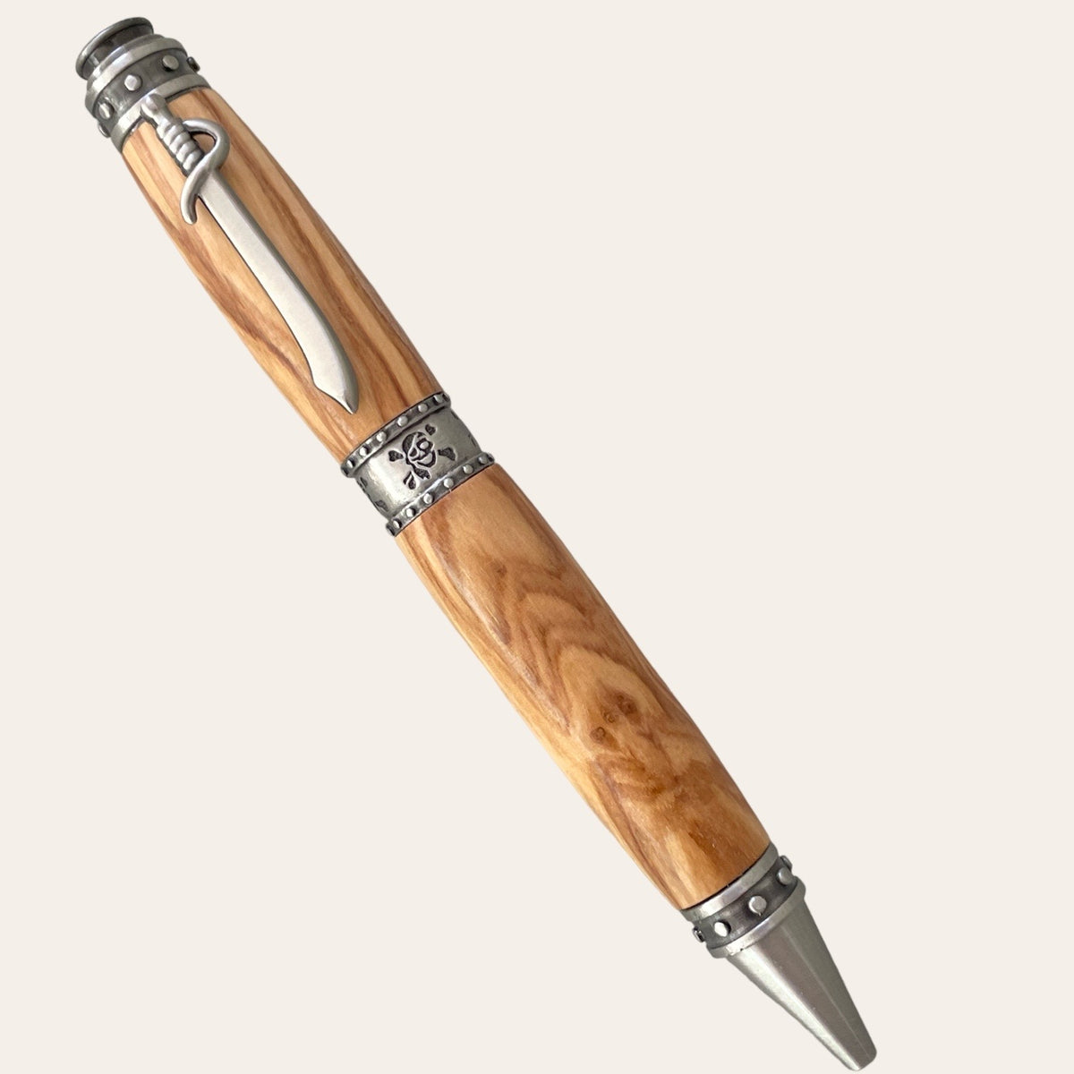 Bethlehem olive wood pirate theme twist pen with pewter trim. Paul's Hand Turned Creations