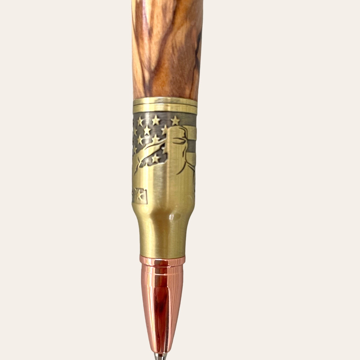 serviceman design on the nib of the Salute The Troops Bolt Action Hand Turned Pen with Bethlehem Olive Wood Pens  Paul's Hand Turned Creations