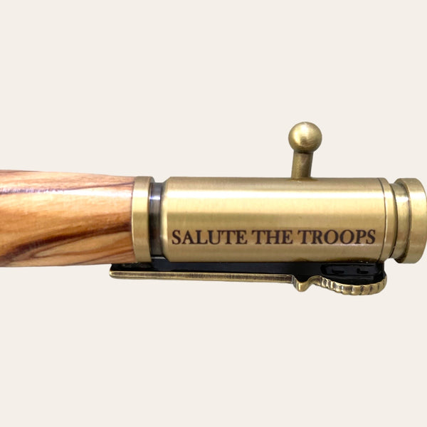 Salute the troops saying up top of the Salute The Troops Bolt Action Hand Turned Pen with Bethlehem Olive Wood Pens Paul's Hand Turned Creations